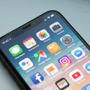 Smartphone showing app icons on its screen