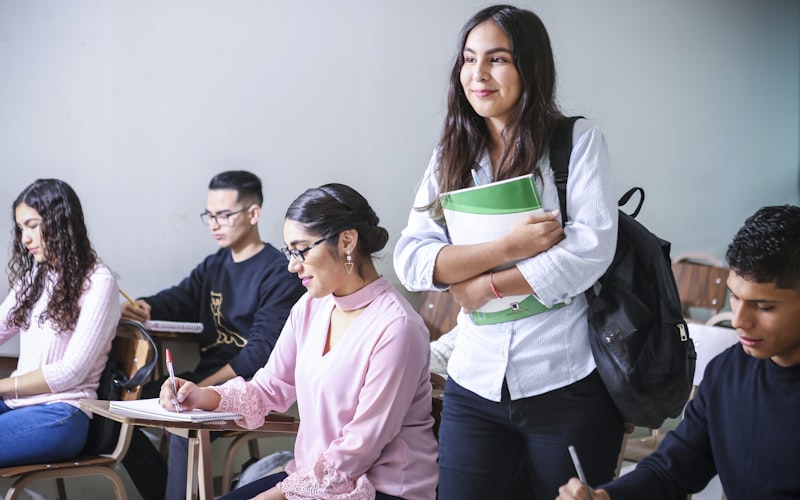 Diverse group of high school students working in a classroom
